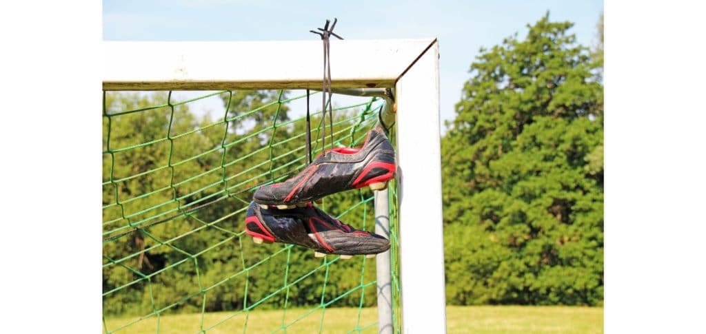 playing soccer in the rain - use boots or turf trainers