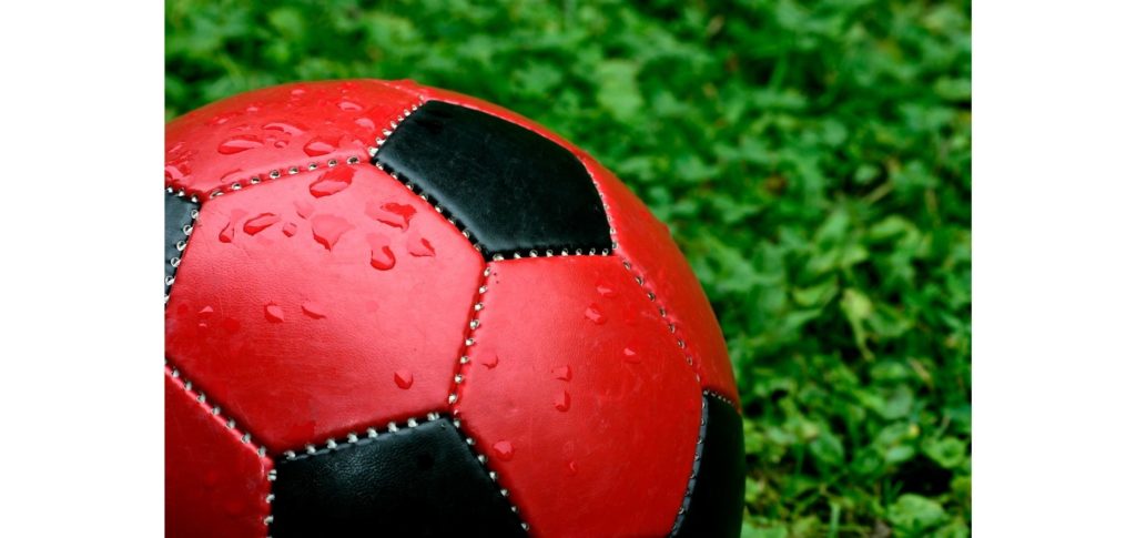soccer balls in water - moisture absorption