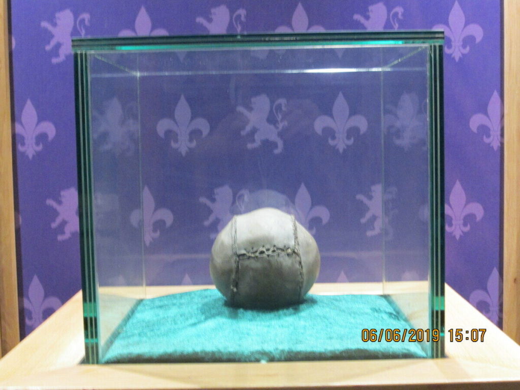 the oldest soccer ball in the world - glass casing