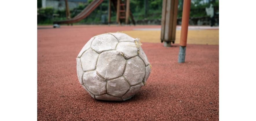 using a soccer ball on concrete - damaged outer covering