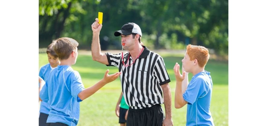 why soccer referees have two whistles - avoiding player confusion