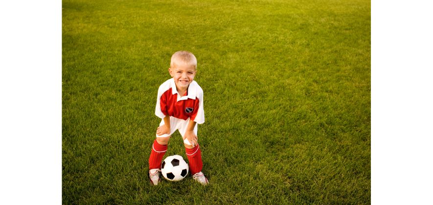 why soccer players walk out with children before games - motivating them to fulfil their dreams
