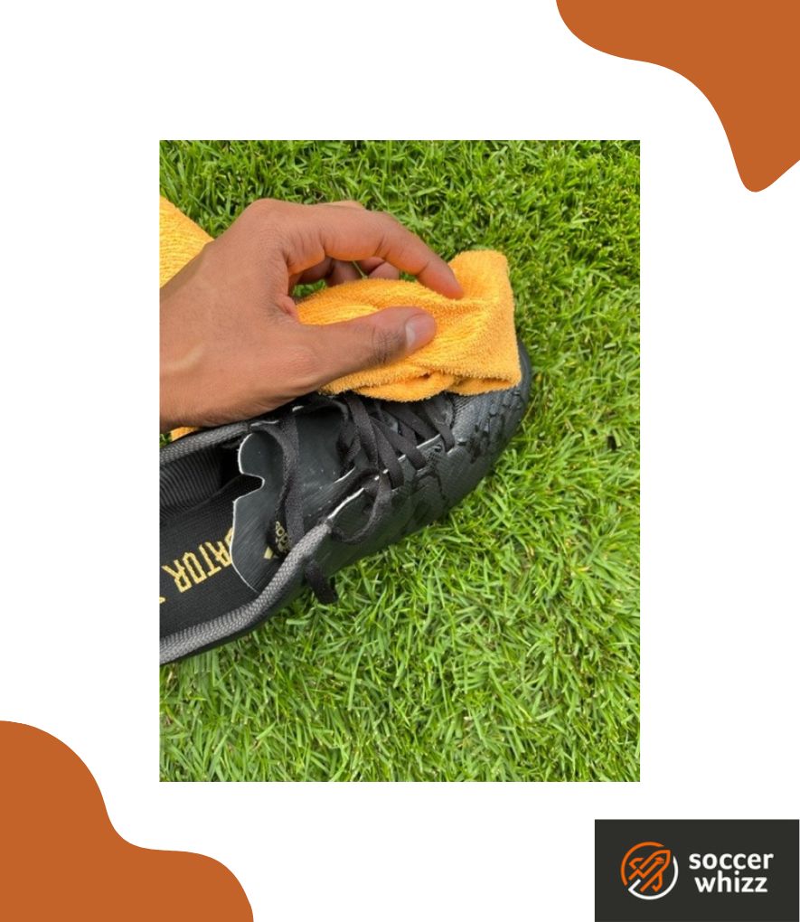 how to dry soccer cleats - wipe them with a dry cloth